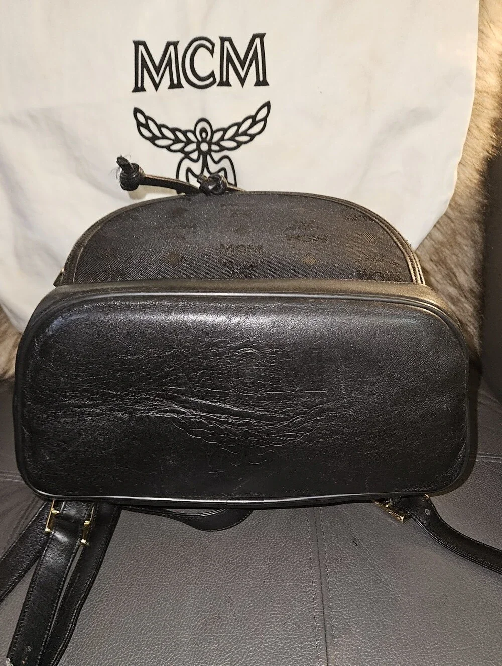 MCM Black Logo Drawstring Backpack with Gold Plaque